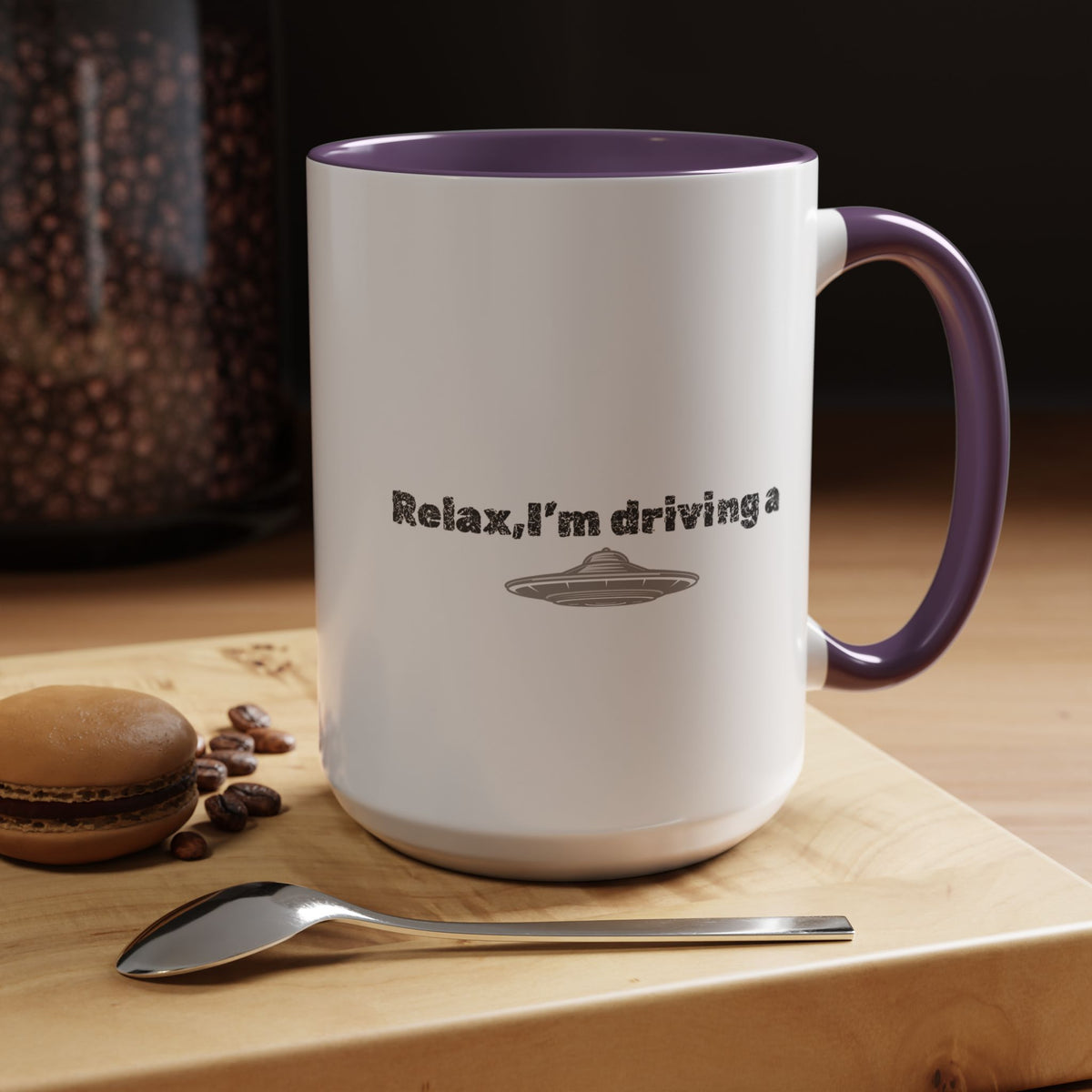 Ceramic coffee mug with "Relax, I’m Driving" UFO accent design, available in 11 oz or 15 oz sizes, by Printify.