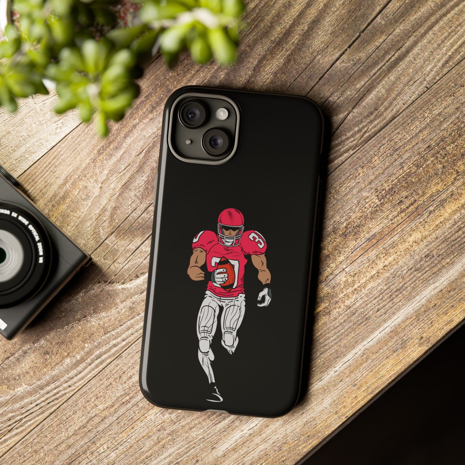 Black protective football player sports phone case for iPhone, durable and stylish, by Printify.
