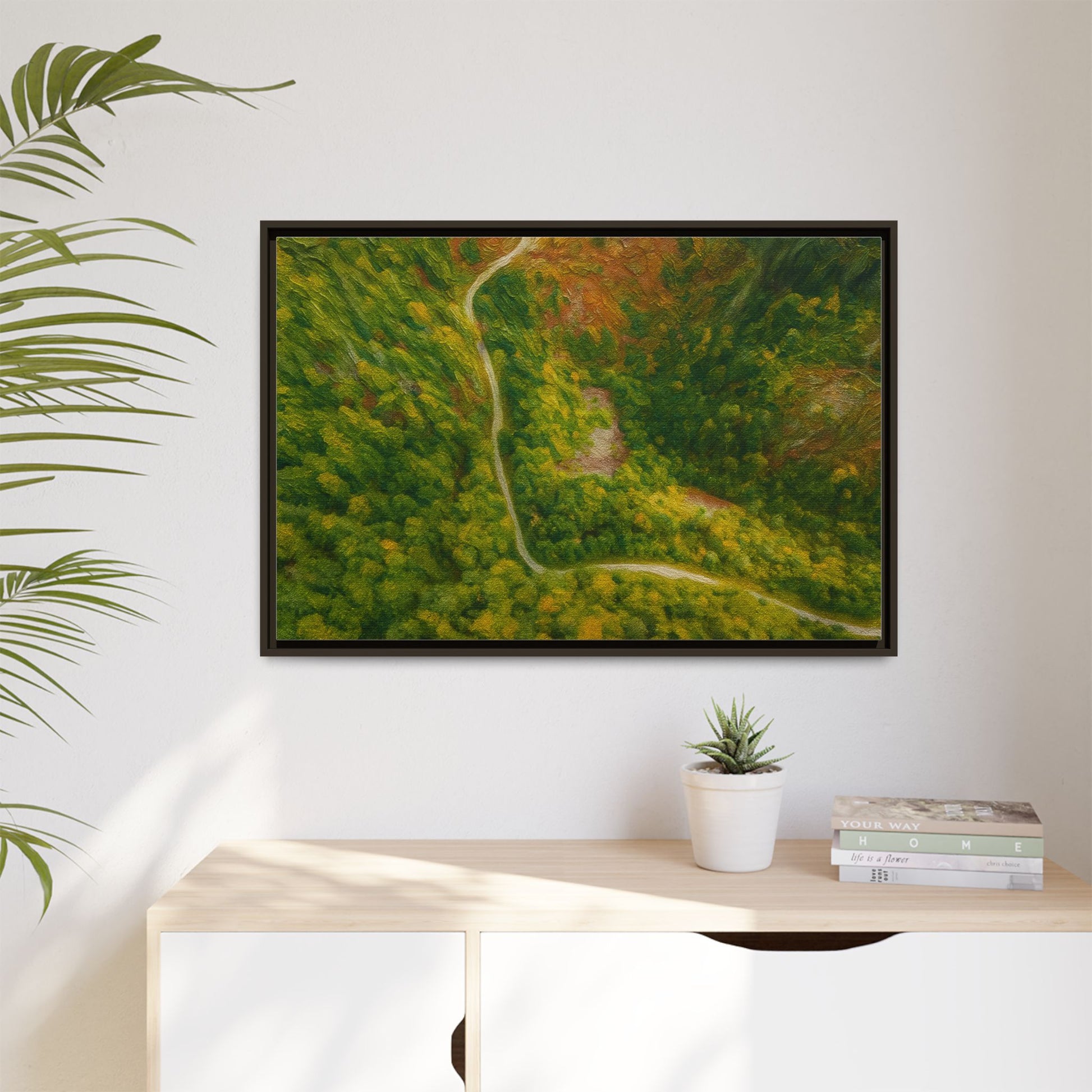 Framed matte canvas wall art featuring a colorful aerial forest path landscape by Printify