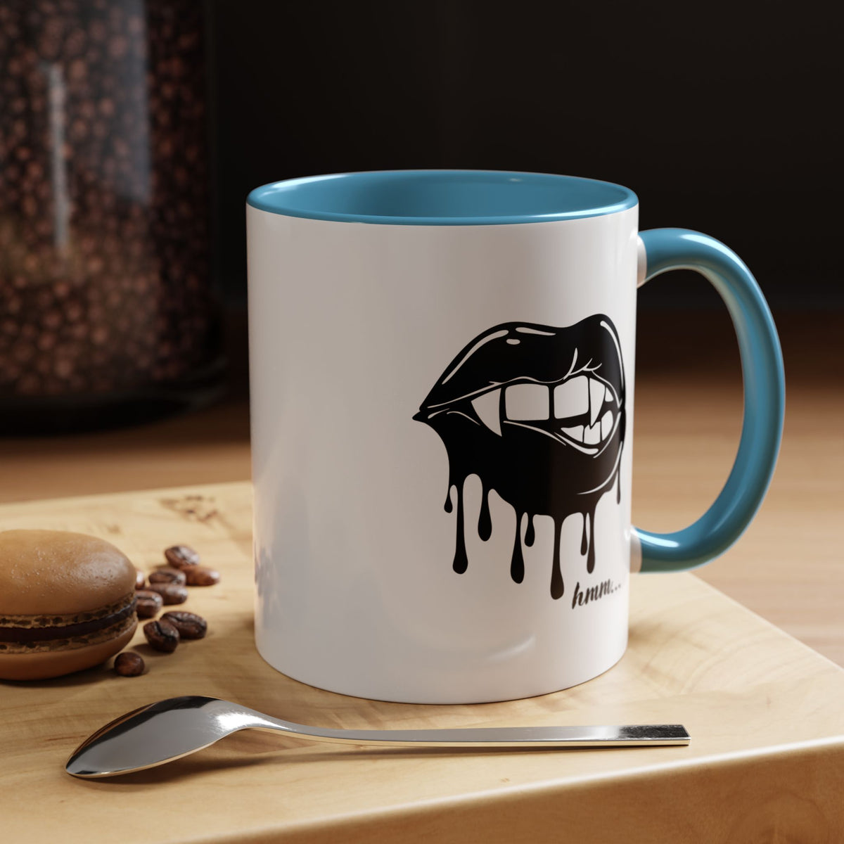 Black dripping lips graphic coffee mug with bite design, 11oz or 15oz, featuring bold print and a stylish accent for hot beverages.