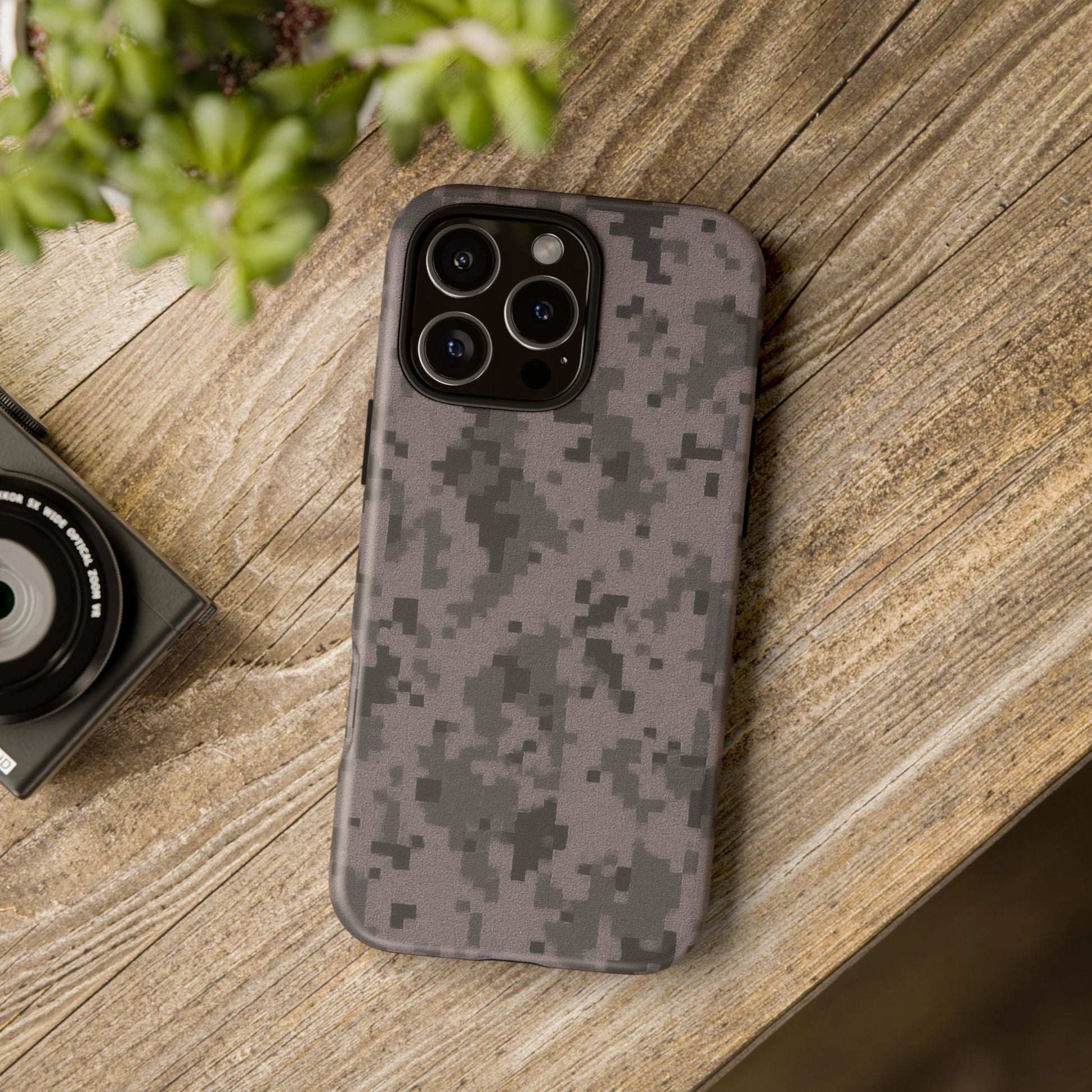 Gray digital camouflage phone case by Printify, tough protective cover designed for smartphones with a rugged camo pattern.