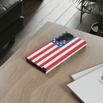 American flag tough phone case for iPhone and Samsung, patriotic protective cover with bold flag design by Printify.