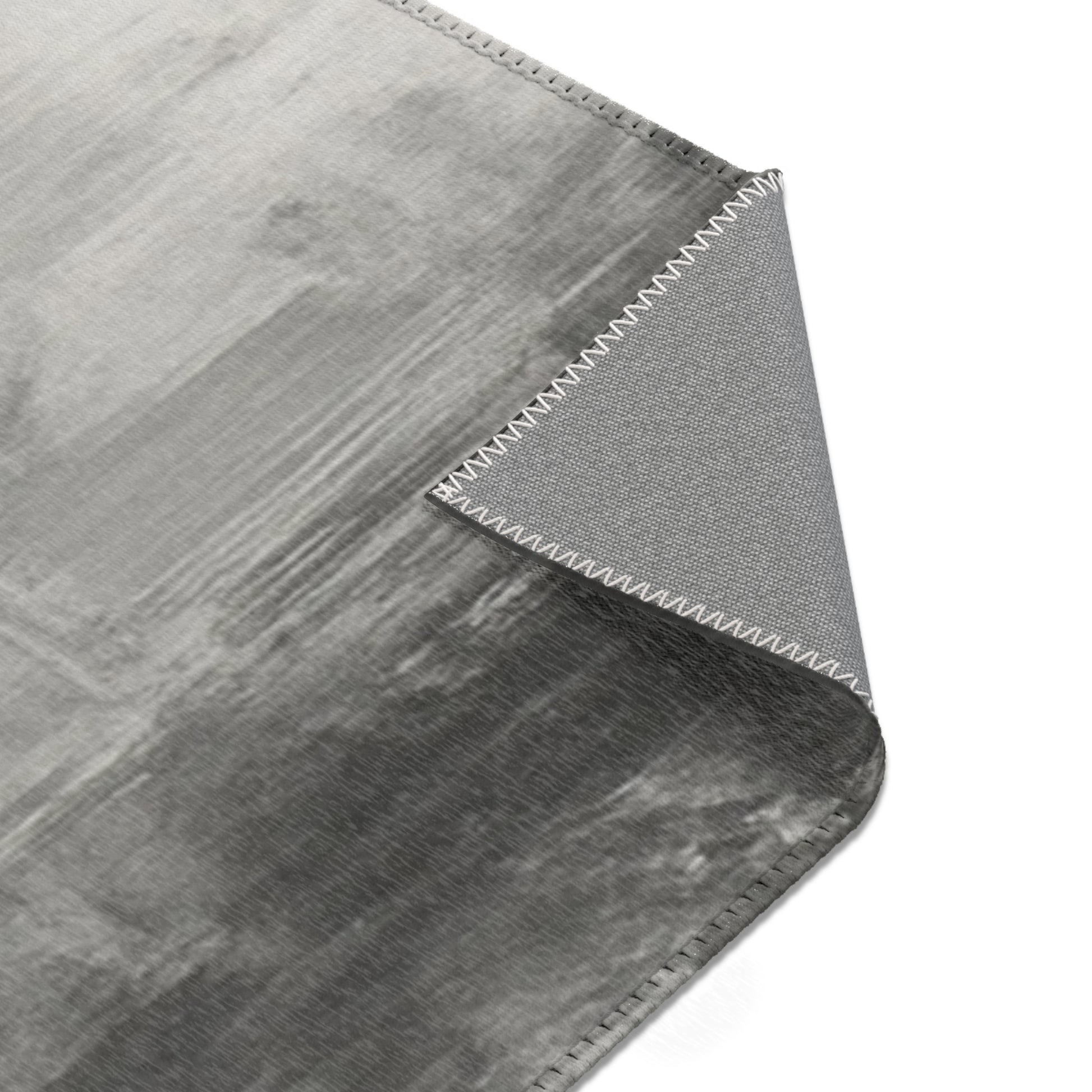 Abstract gray watercolor area rug by Printify, modern neutral design, perfect for living room accents and contemporary decor.