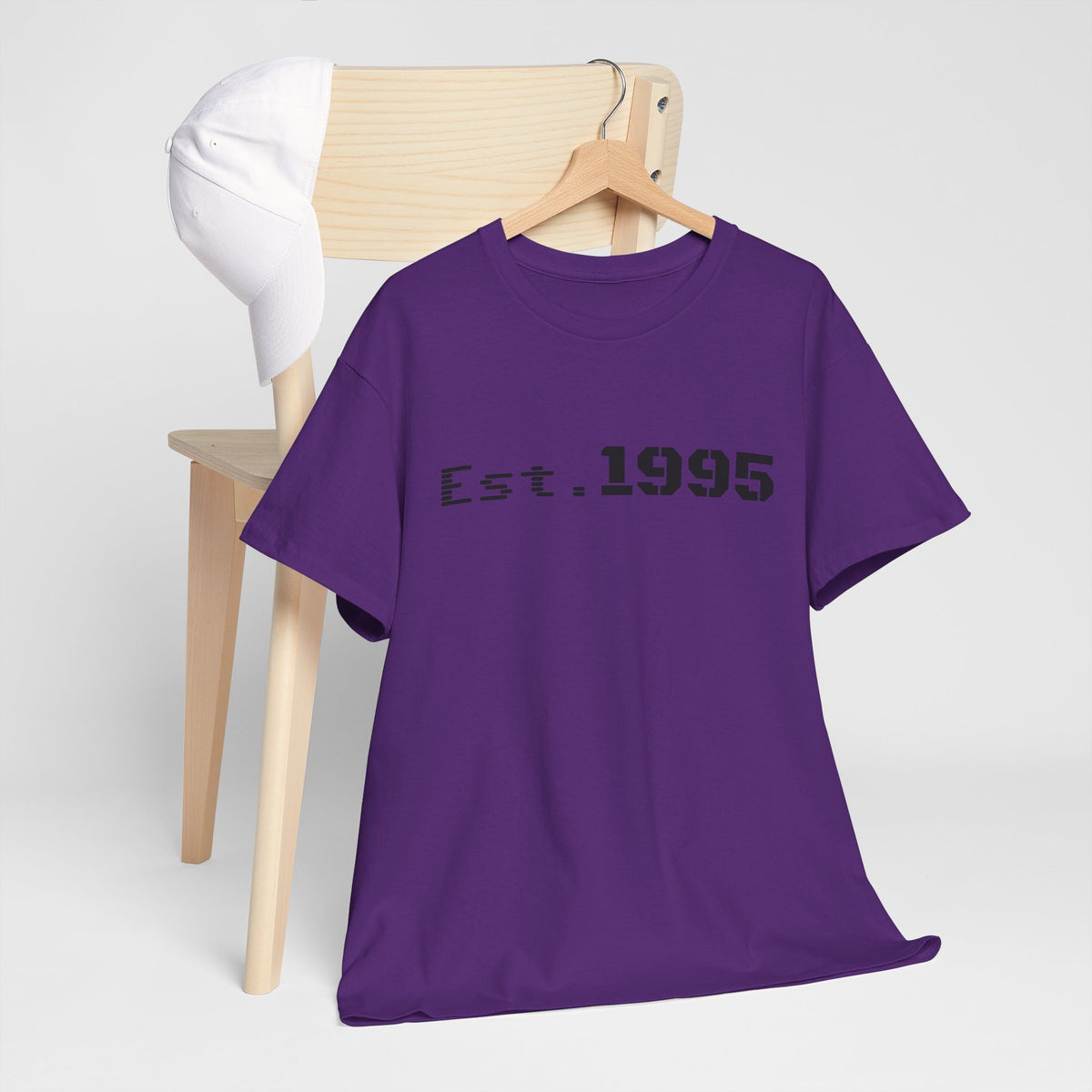 Vintage minimalist Est. 1995 T-shirt by Printify featuring a simple "Born in 1995" birthday design on soft fabric.