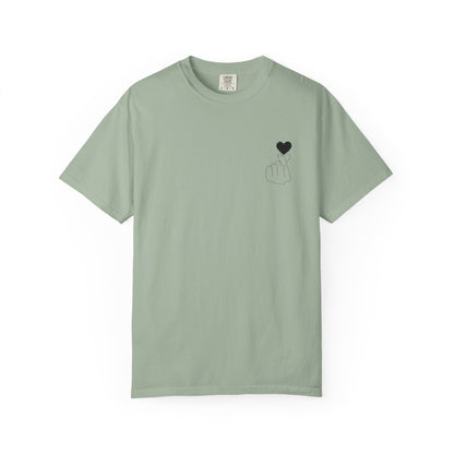 Black T-shirt with minimal pink finger heart graphic, casual style, by Printify, featuring a simple heart design on the front.