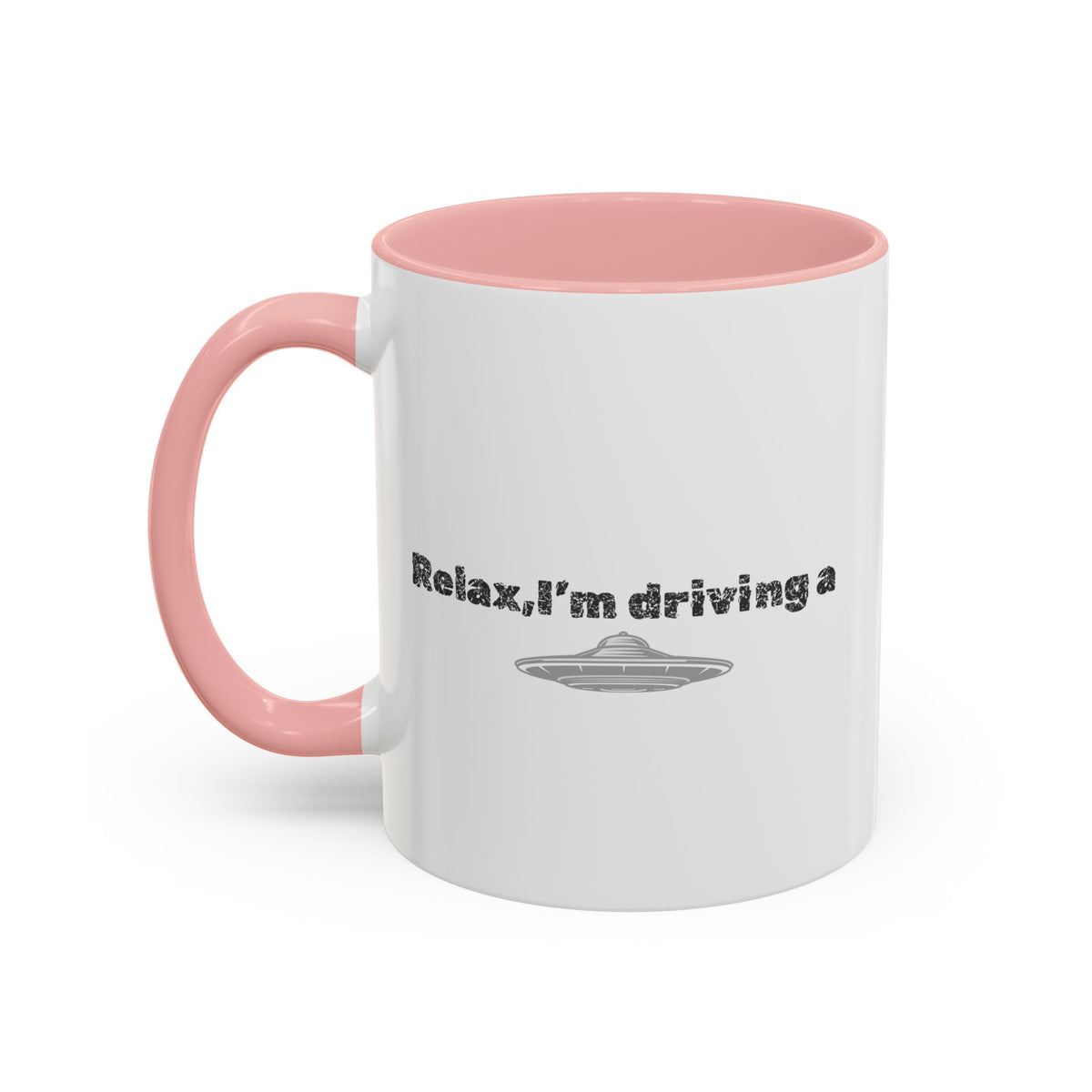 Ceramic coffee mug with "Relax, I’m Driving" UFO accent design in 11 oz size, featuring a playful space-themed print.