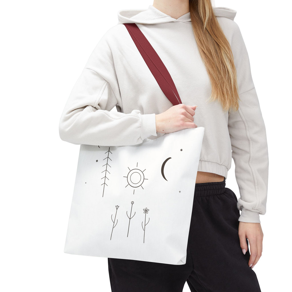 Minimal Moon and Sun botanical tote bag with celestial line art design, featuring natural plant motifs and sturdy handles.
