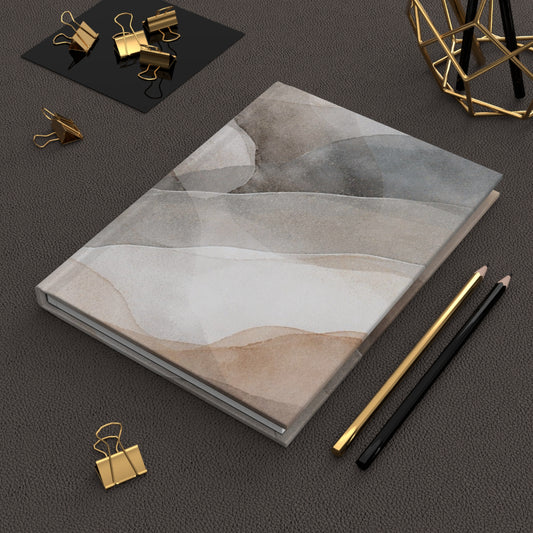 Neutral watercolor waves hardcover journal with matte abstract landscape cover, ideal for writing and note-taking.