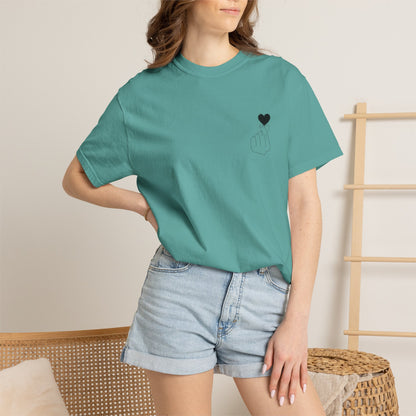 Black T-shirt with minimal white finger heart graphic, casual style, by Printify, featuring a simple heart design on the front.