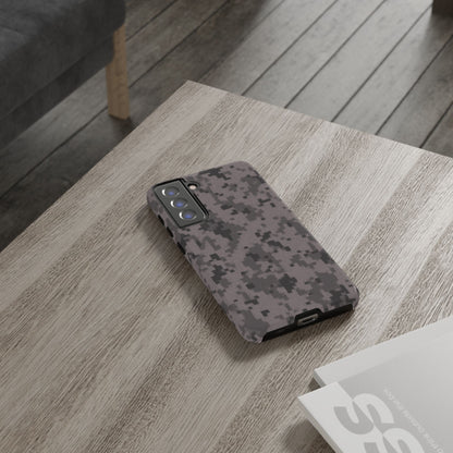 Gray digital camouflage phone case by Printify, showing a tough protective cover with a digital camo pattern on a smartphone.
