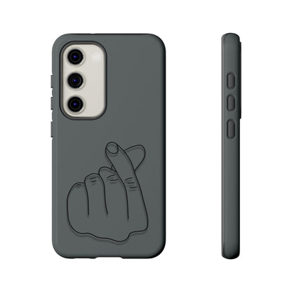 Silicone phone case with embossed Korean finger heart design from Printify, featuring a smooth texture and vibrant detailing.