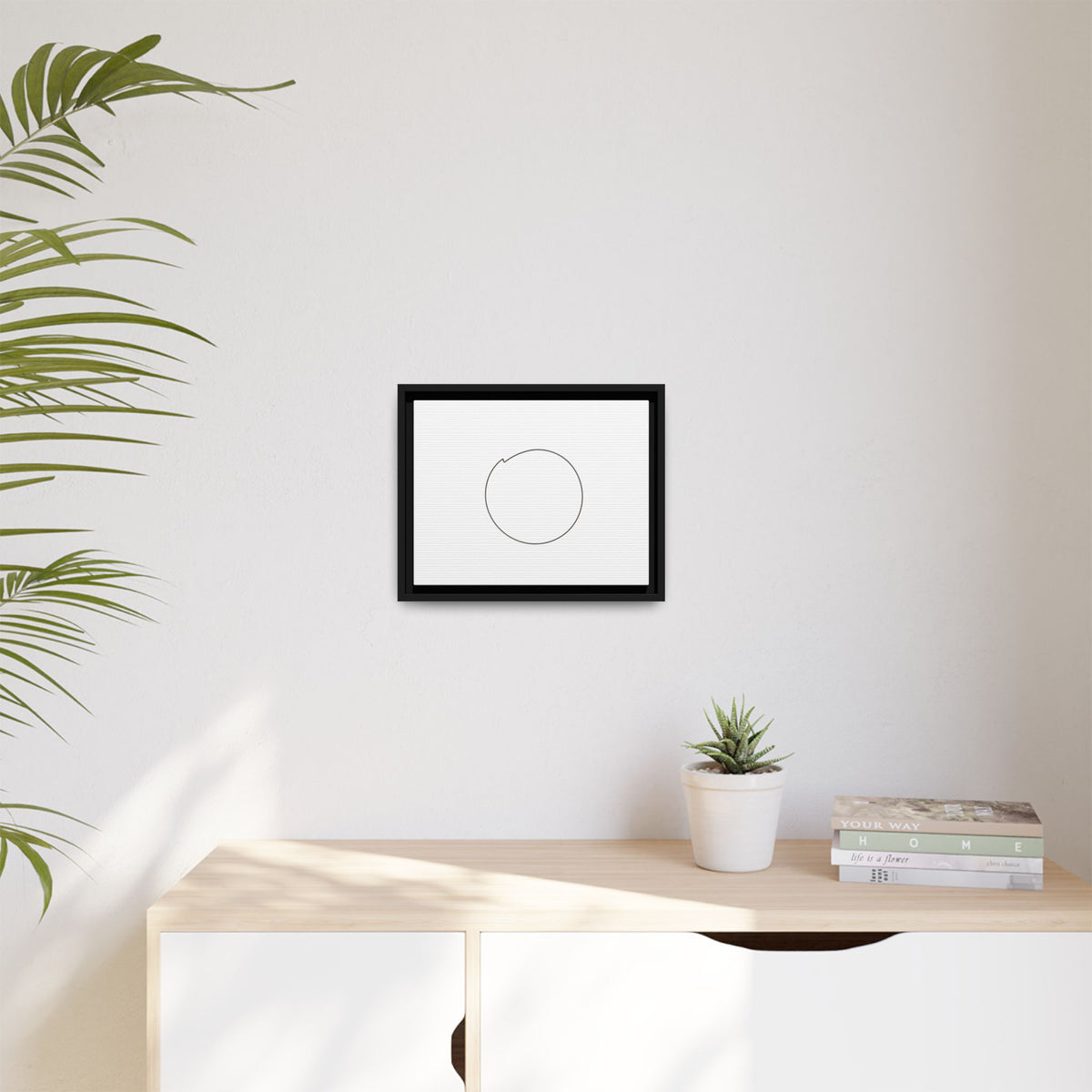 Framed matte canvas wall art featuring a minimal circular line design, showcasing modern abstract artwork by Printify.