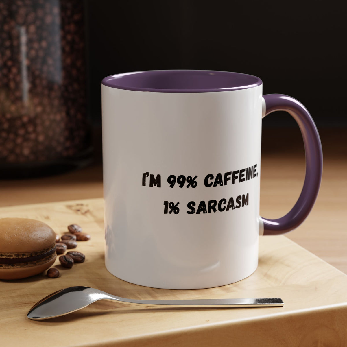 Ceramic coffee mug with "I'm 99% Caffeine, 1% Sarcasm" print, accent mug from Printify, showing the humorous design.