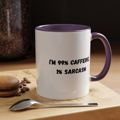 Ceramic coffee mug with "I'm 99% Caffeine, 1% Sarcasm" print, accent mug from Printify, showing the humorous design.