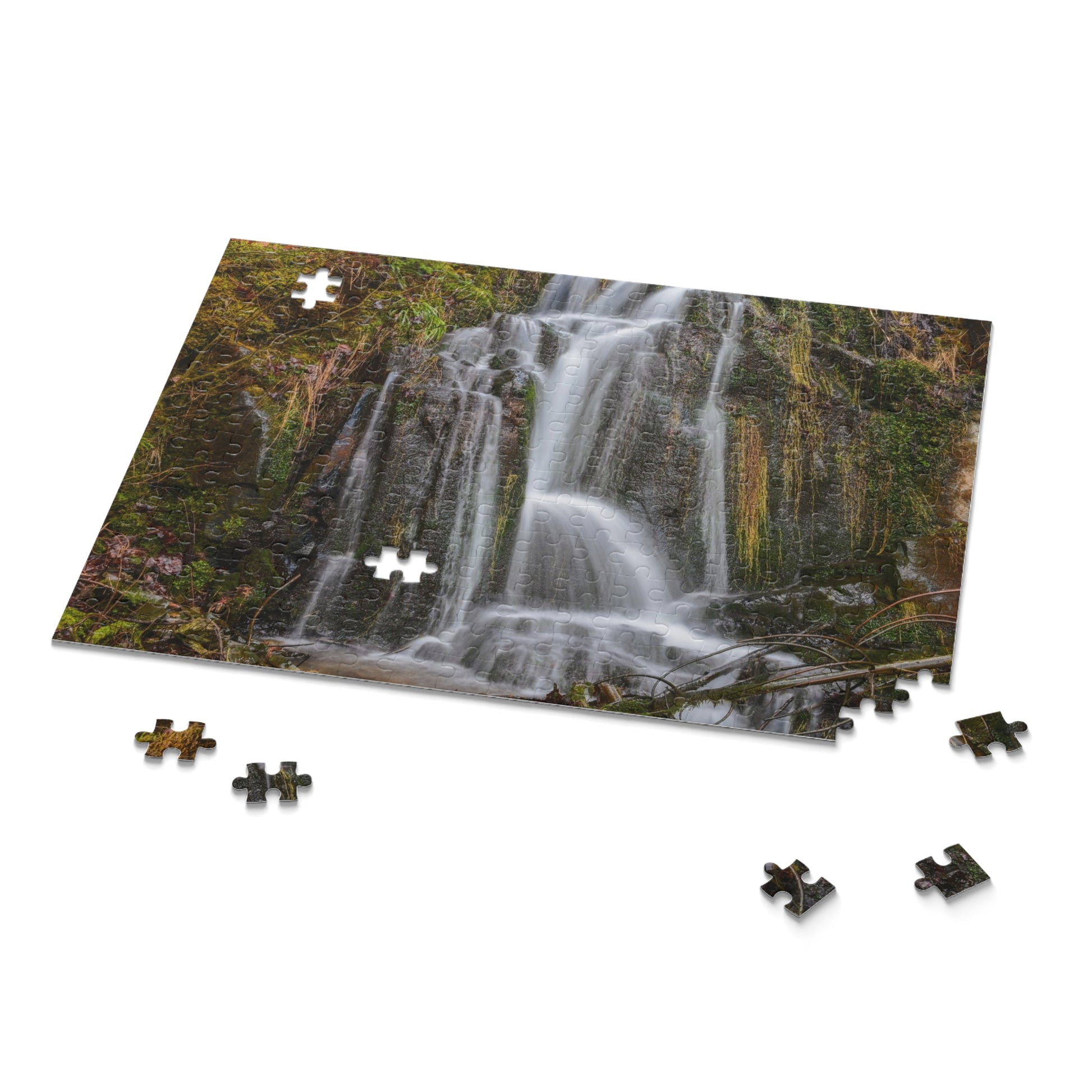 Colorful Mossy Waterfall Puzzle by Printify featuring vibrant nature scene with lush greenery and flowing water, perfect for puzzle enthusiasts.
