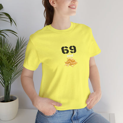 Unisex graphic T-shirt featuring humorous "69 & French Fries" design in black on a white background, casual and fun apparel.