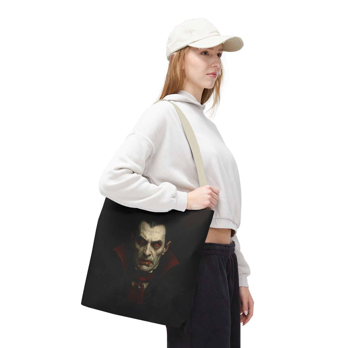 Gothic vampire tote bag with spooky Halloween design, black fabric, and print details, perfect for spooky season accessories.