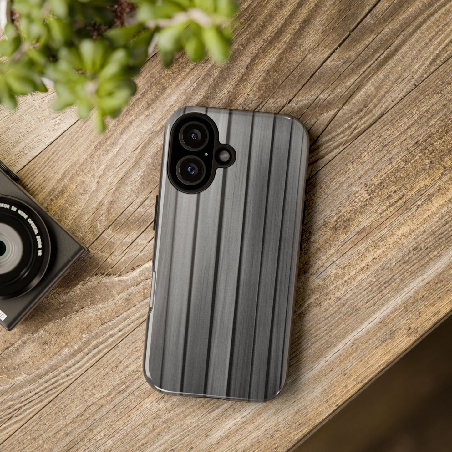Ribbed metal texture phone case for iPhone, tough protective cover by Printify with a sleek, durable design.