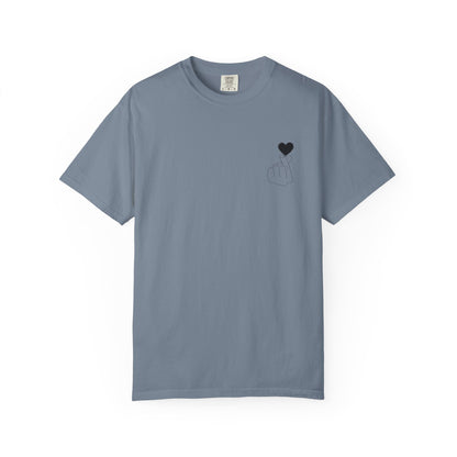 Black T-shirt with minimal white finger heart graphic, casual unisex design by Printify, perfect for expressing love and style.