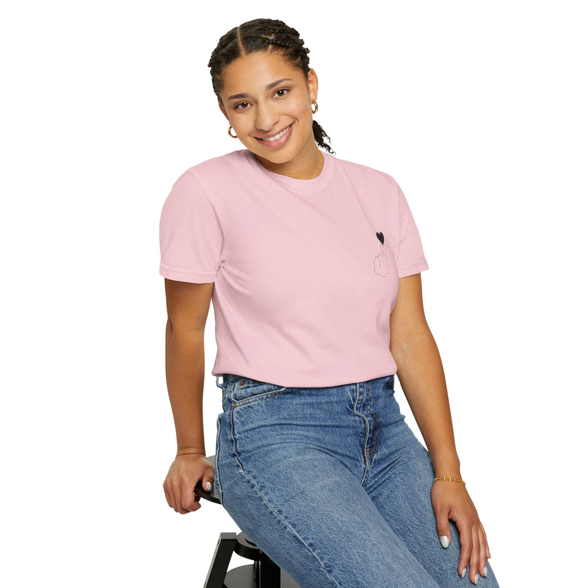 Black T-shirt with a minimal white finger heart graphic, casual style, by Printify, displayed flat on a white background.