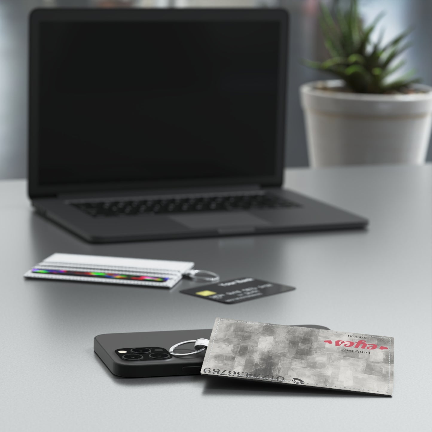 Abstract gray brushstroke saffiano leather card holder by Printify, minimalist accessory with sleek design and compact size.