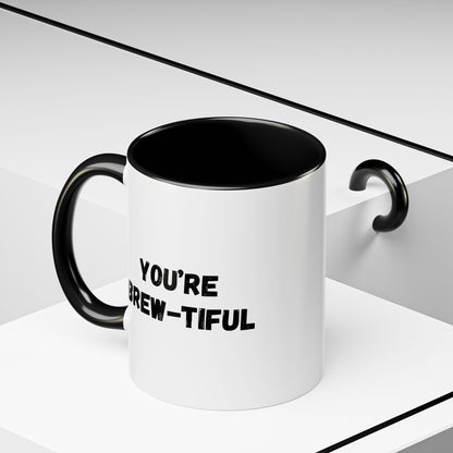 You’re Brew-tiful Coffee Mug – Cute Coffee Pun Accent Mug (11/15oz) — white ceramic accent mug with glossy finish and bold black “YOU’RE BREW-TIFUL” print, front view