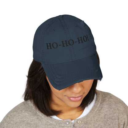 Distressed embroidered "HO-HO-HO" dad hat by Printify, showing a casual baseball cap with festive holiday message in front.