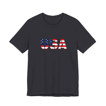 USA flag text T-shirt by Printify featuring patriotic Fourth of July design, casual cotton T-shirt with bold American flag print.