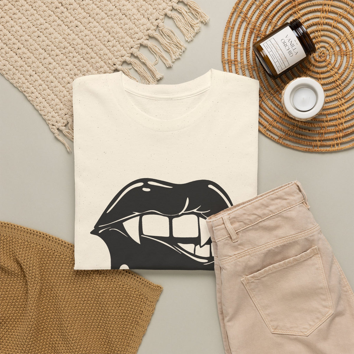 Graphic T-shirt featuring dripping lips with 'hmm...' bite design by Printify, showcasing a bold, artistic graphic tee.