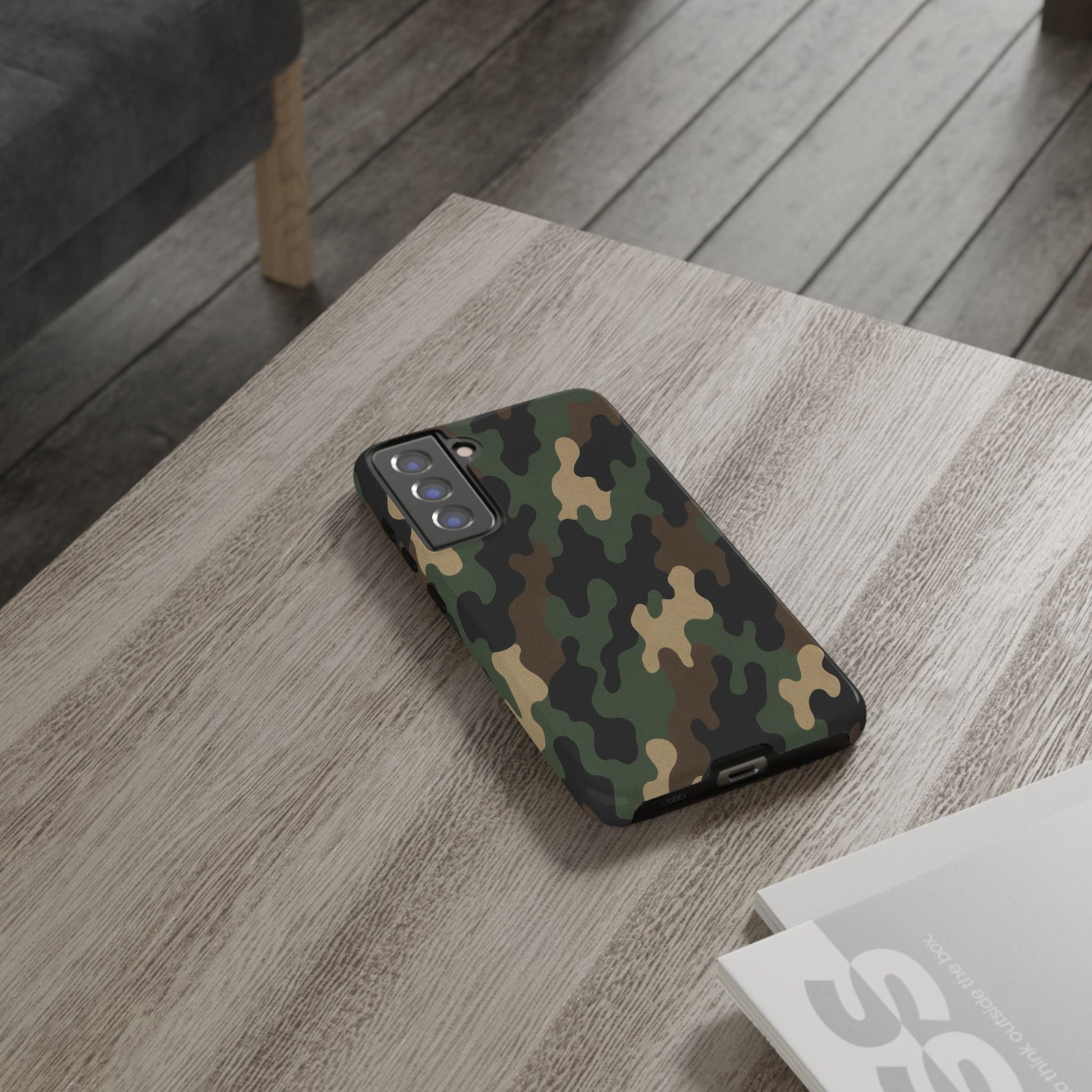 Camouflage tough phone case for rugged protection, featuring a camo pattern and durable design from Printify.