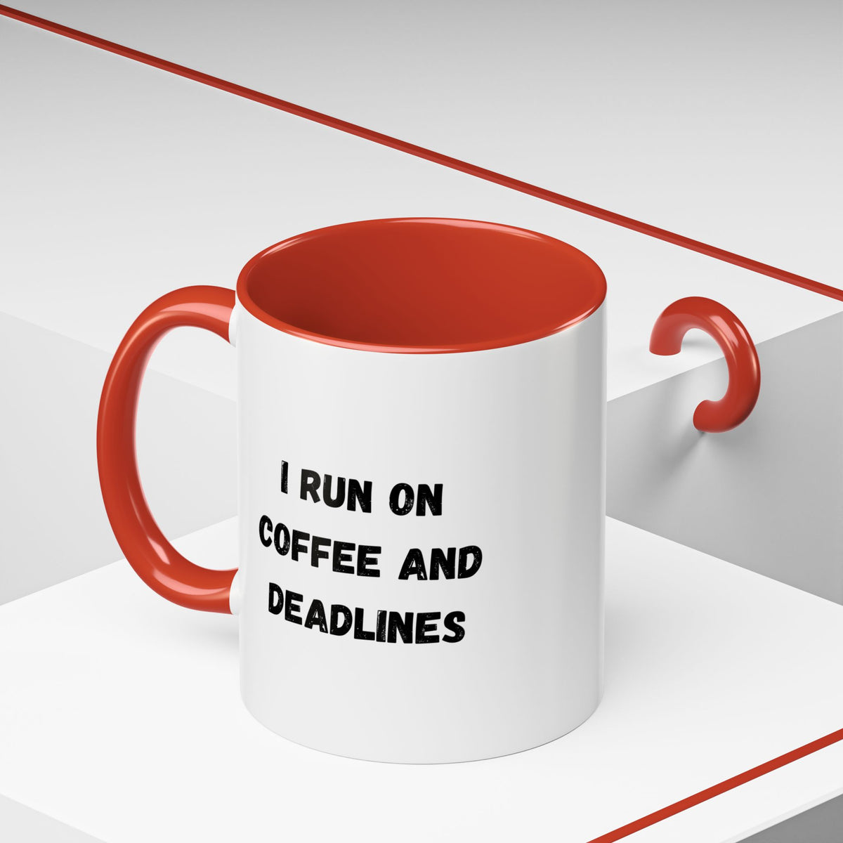 White ceramic mug with "I Run on Coffee and Deadlines" printed in black, featuring a coffee cup graphic on a plain background.
