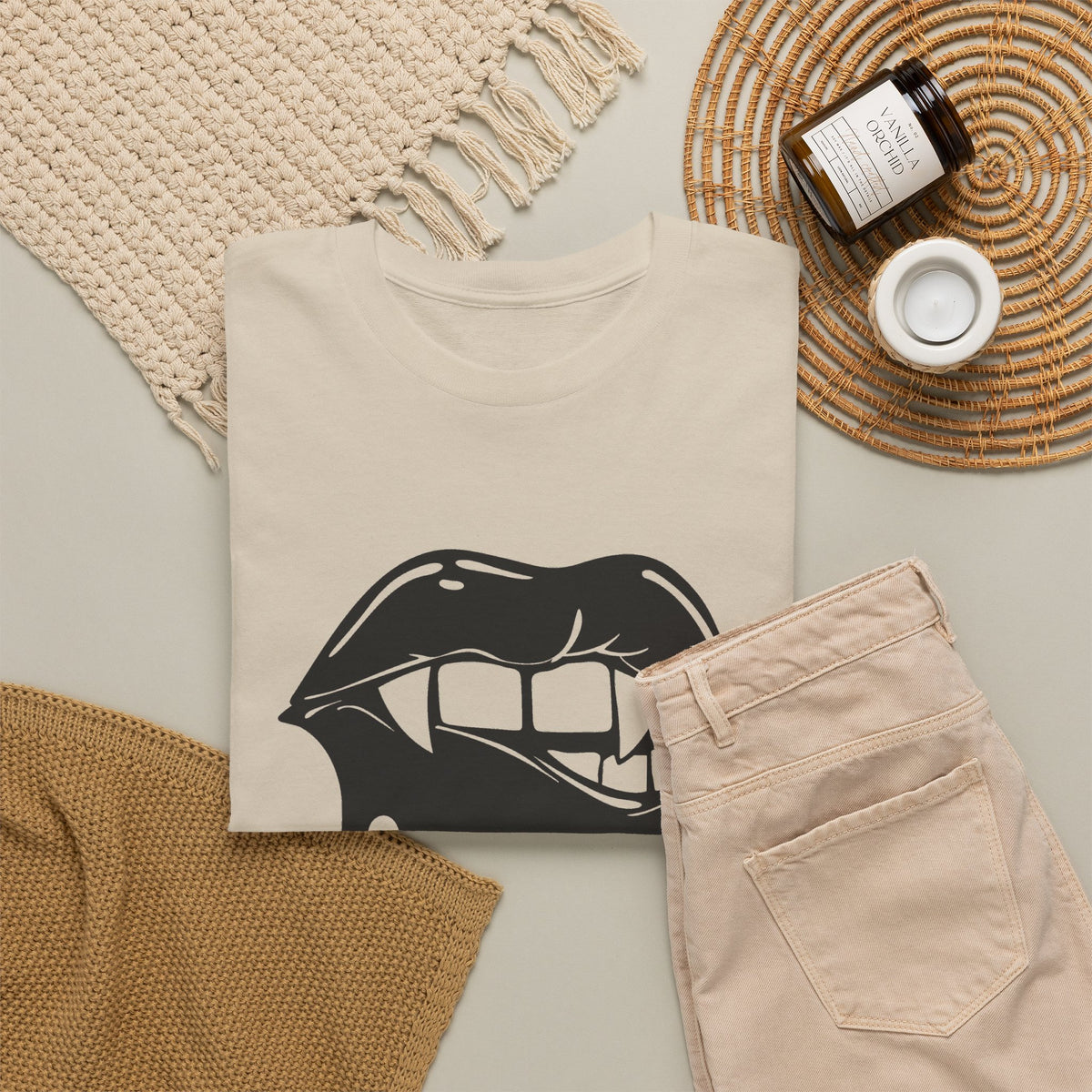 Graphic T-shirt by Printify featuring a dripping lips "hmm..." bite design on a white cotton tee.
