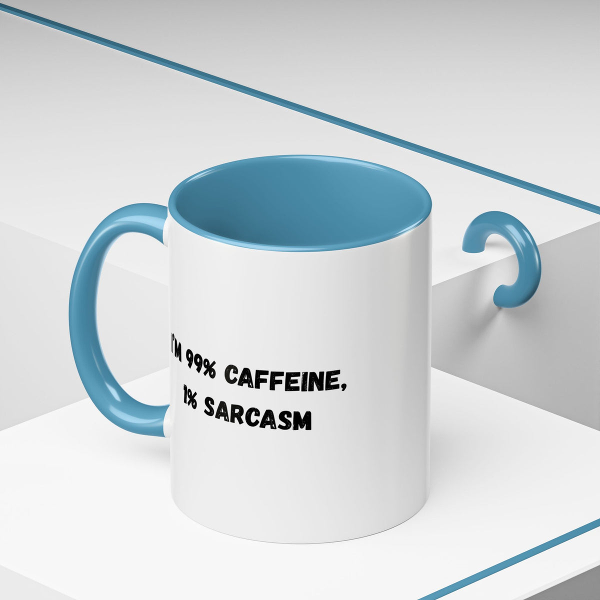 Ceramic coffee mug with "I'm 99% Caffeine, 1% Sarcasm" print, Accent style, designed for hot beverages, by Printify.
