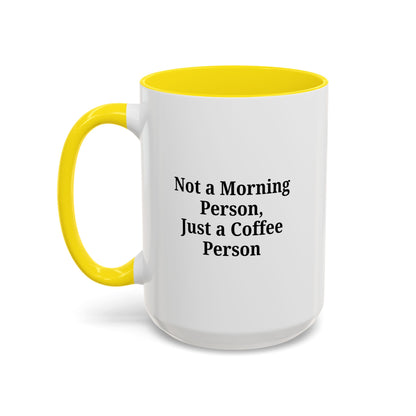 Ceramic coffee mug with "Not a Morning Person, Just a Coffee Person" slogan, featuring a white background and black text.