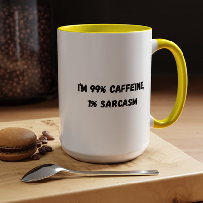 Ceramic coffee mug with "I'm 99% Caffeine, 1% Sarcasm" printed in black text, featuring a white background and a handle.