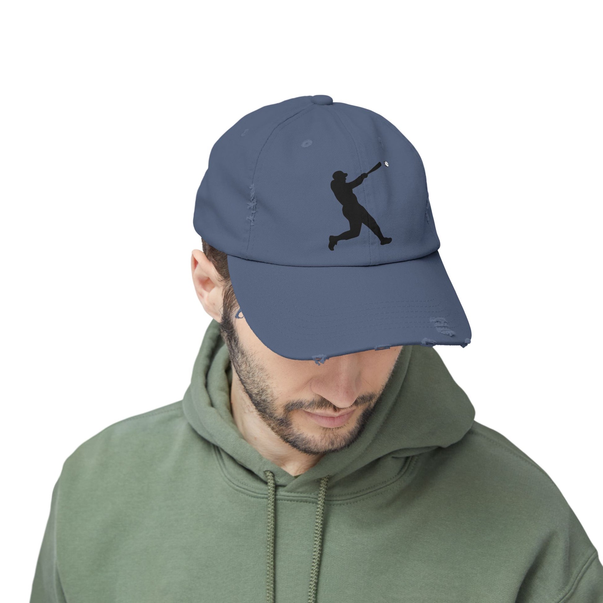 Distressed baseball cap featuring a silhouette batter design, casual hat made by Printify with a worn, vintage look.