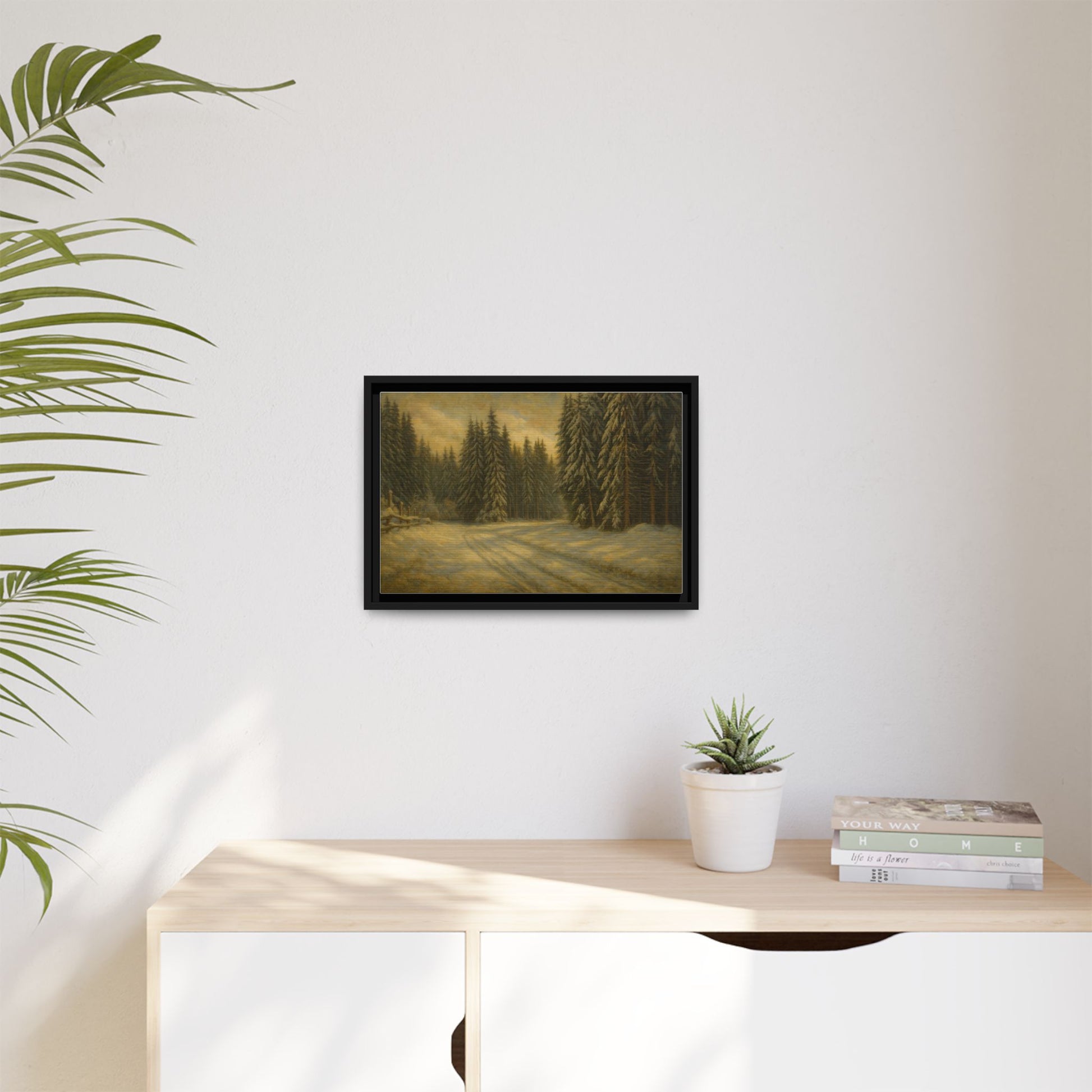 Framed matte canvas wall art featuring a winter forest landscape with trees and snow, by Printify.