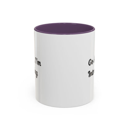 Ceramic coffee mug with "Go Away, I'm Introverting" text, 11 oz size, ideal for introverts and coffee lovers.