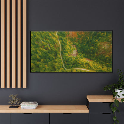 Colorful framed matte canvas wall art featuring an aerial forest path landscape by Printify.