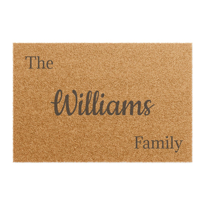 Personalized Script Monogram Welcome doormat with last name, featuring elegant lettering on a durable floor mat by Printify.