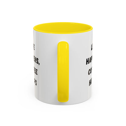 Black ceramic mug with "Life Happens Coffee Helps" text, 11oz or 15oz size, with black handle and rim by Printify.