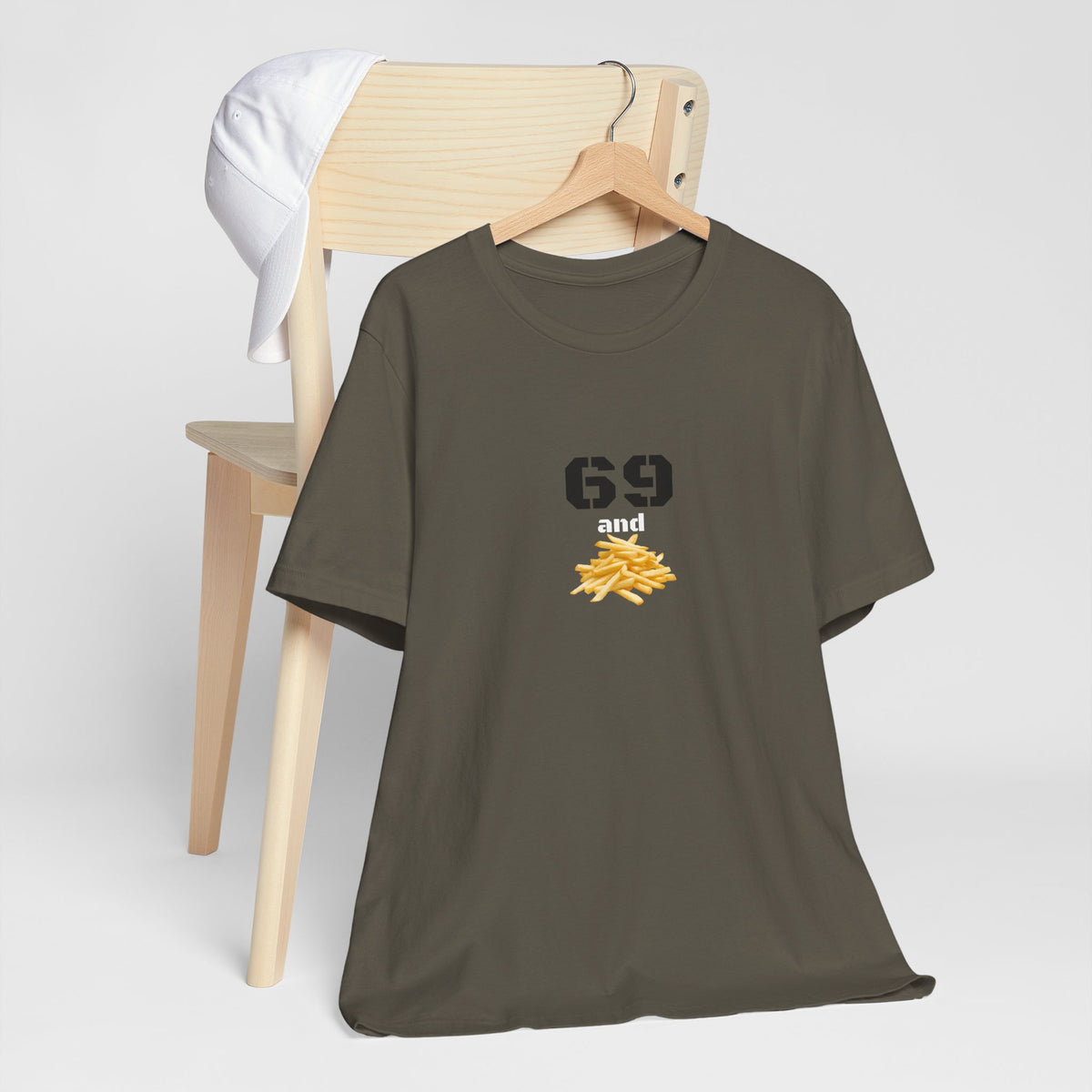 Unisex graphic T-shirt featuring a humorous 69 and French fries design in black with colorful print.
