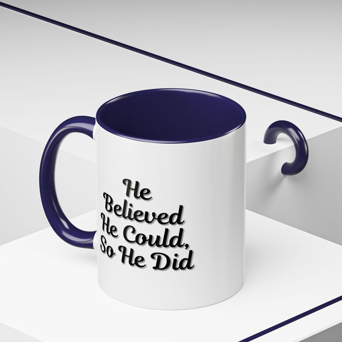 Printify inspirational coffee mug with the phrase "He Believed He Could So He Did" displayed on a ceramic mug.