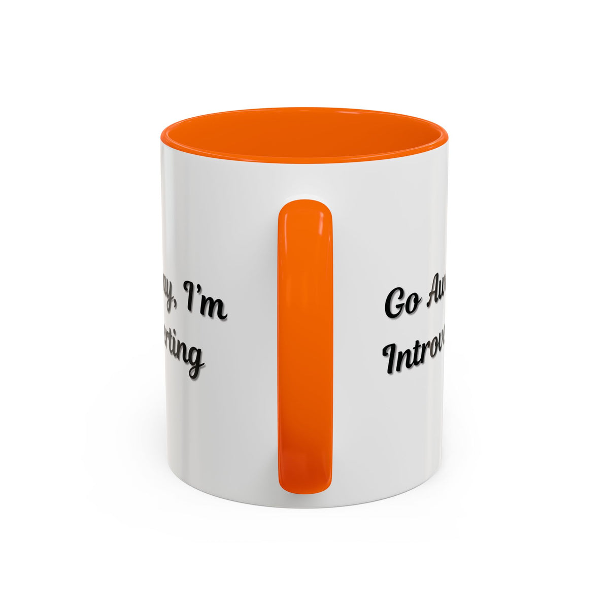 Ceramic mug with "Go Away, I'm Introverting" text, 11 oz size, featuring a white exterior and black handle for coffee or tea.