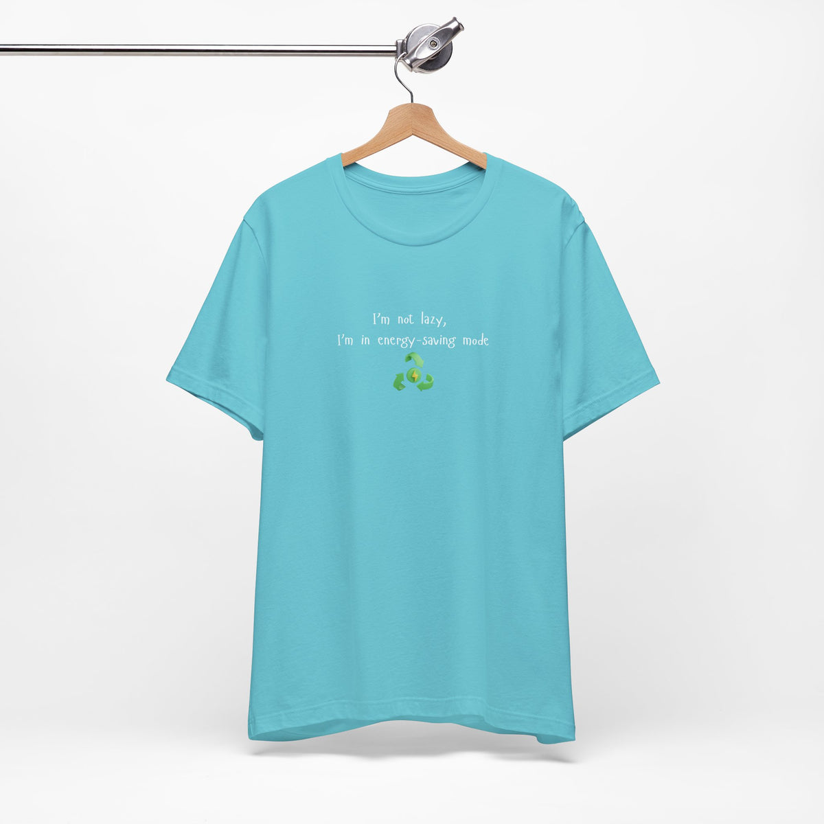 Eco humor T-shirt featuring the phrase "I’m Not Lazy, I’m an Energy-Saving Mock" printed on a casual cotton tee.