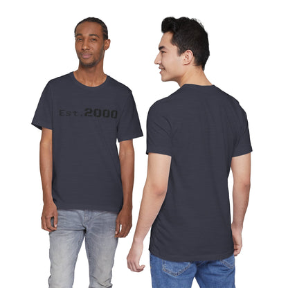 Retro pixel design T-shirt by Printify celebrating the year 2000, featuring a colorful vintage-inspired graphic on a casual tee.