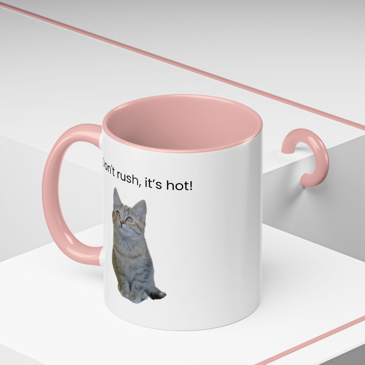 Ceramic cat coffee mug with "Don't rush, it's hot!" slogan, 11 oz, featuring a cute cat design for hot beverage enjoyment.