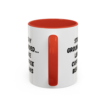 White ceramic mug featuring "Stay Grounded Like Coffee Beans" printed design, ideal for coffee lovers, 11oz size.