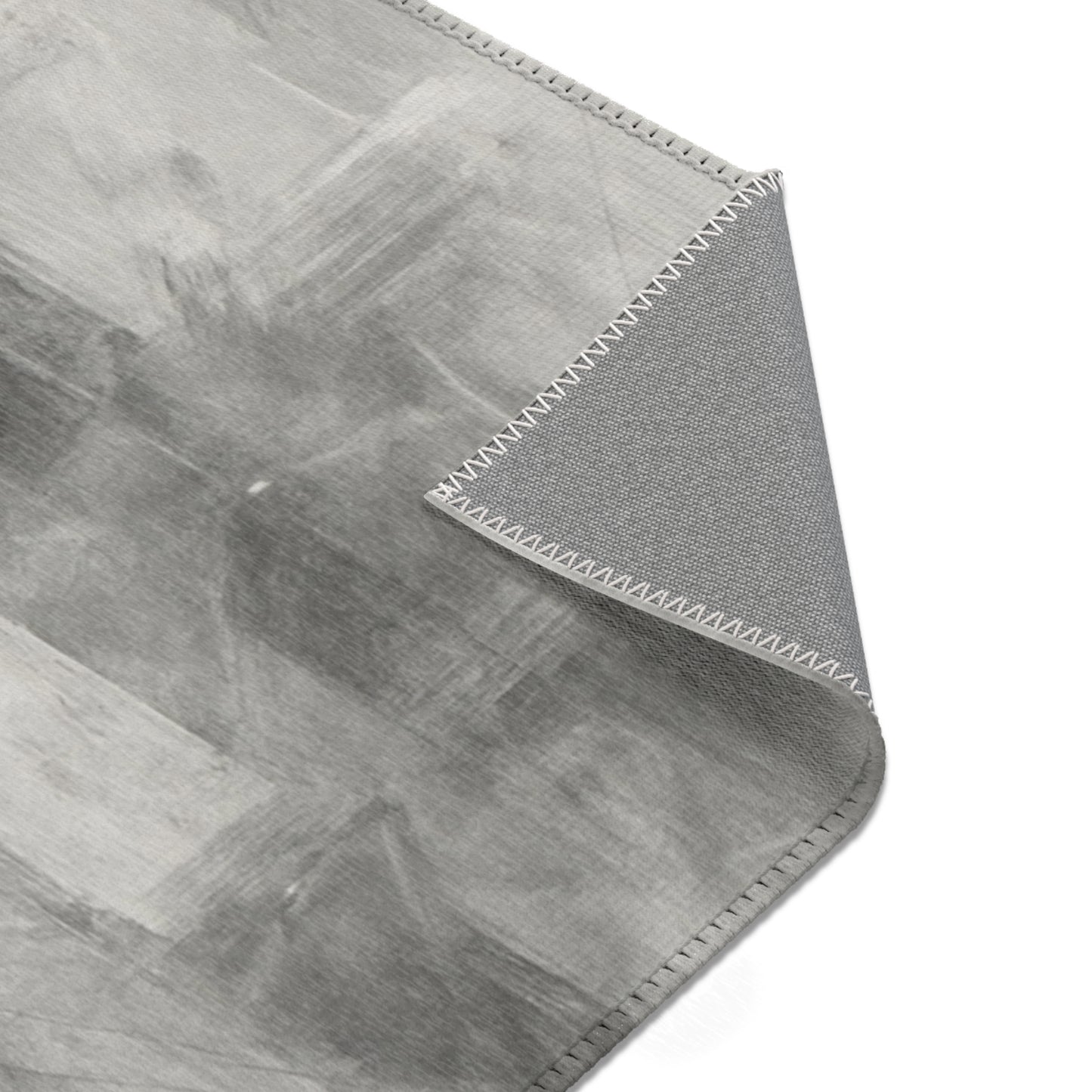 Abstract gray watercolor area rug by Printify, modern neutral design suitable for living room accents.