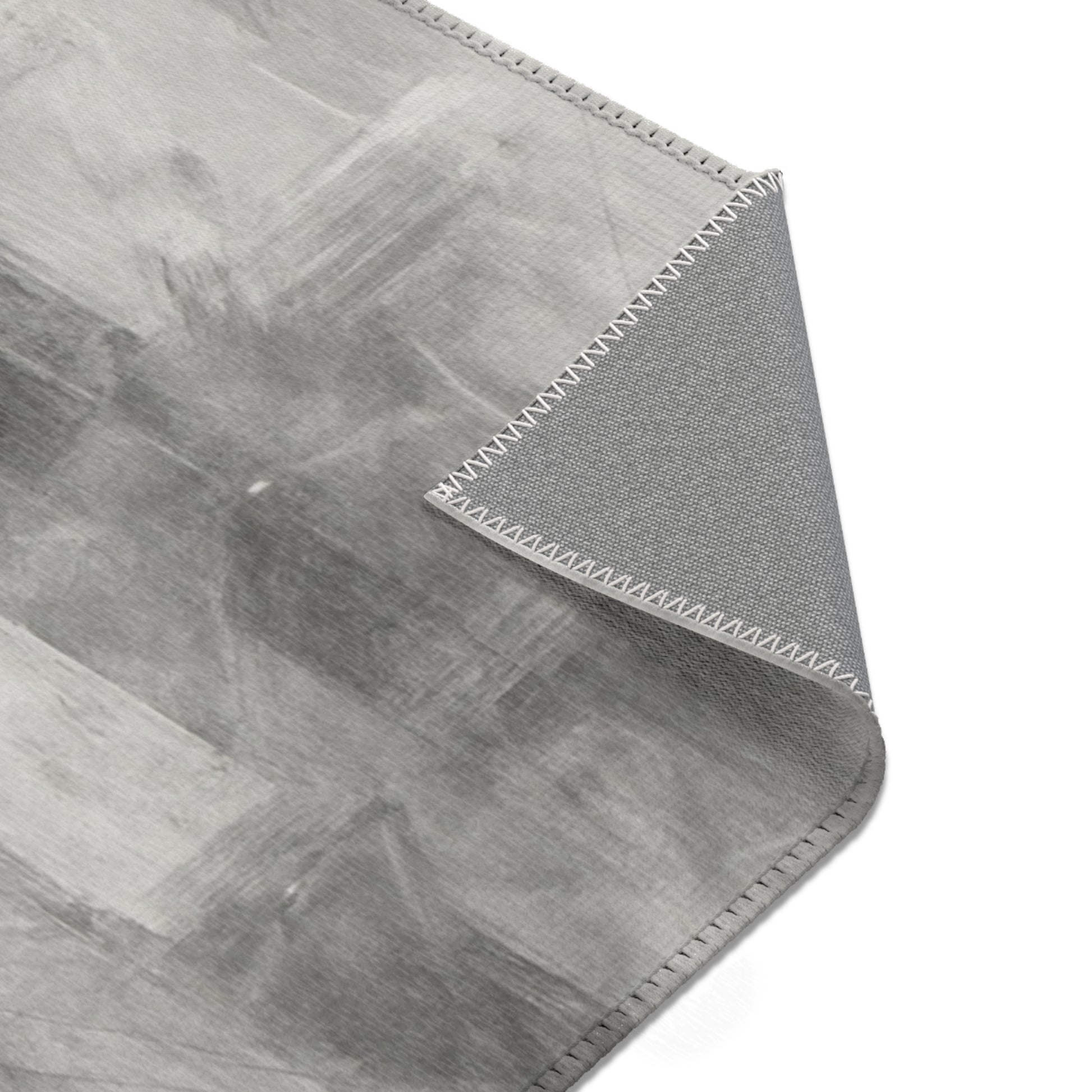 Abstract gray watercolor area rug by Printify, modern neutral design suitable for living room accents.